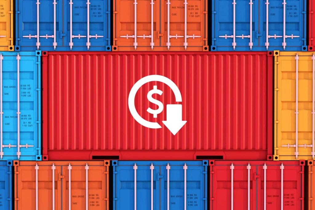 Red shipping container with declining cost icon among stacked containers.
